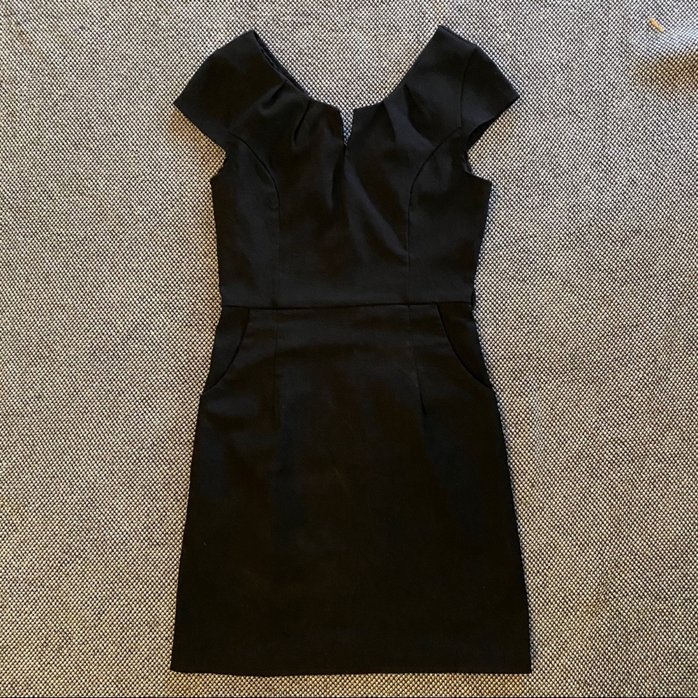 Little black dress with pockets and stretchy!